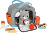 Katze mit Tasche und Pflege-Set