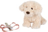 Dog with a pink bag and care set
